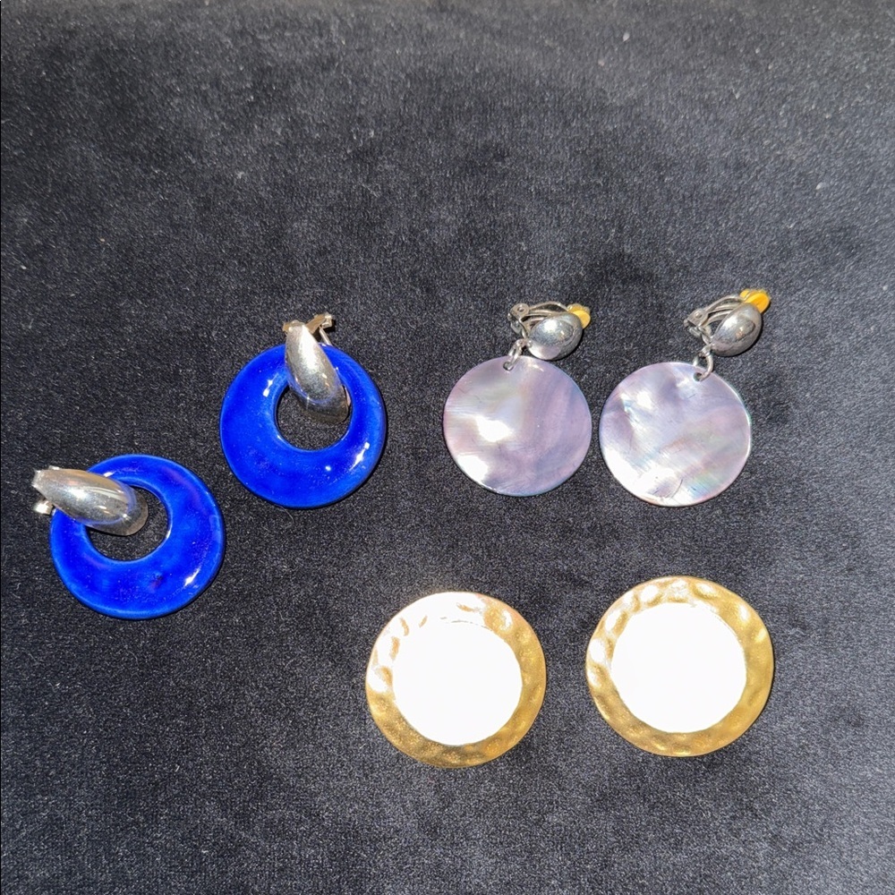 Three pair of fashion clip on earrings